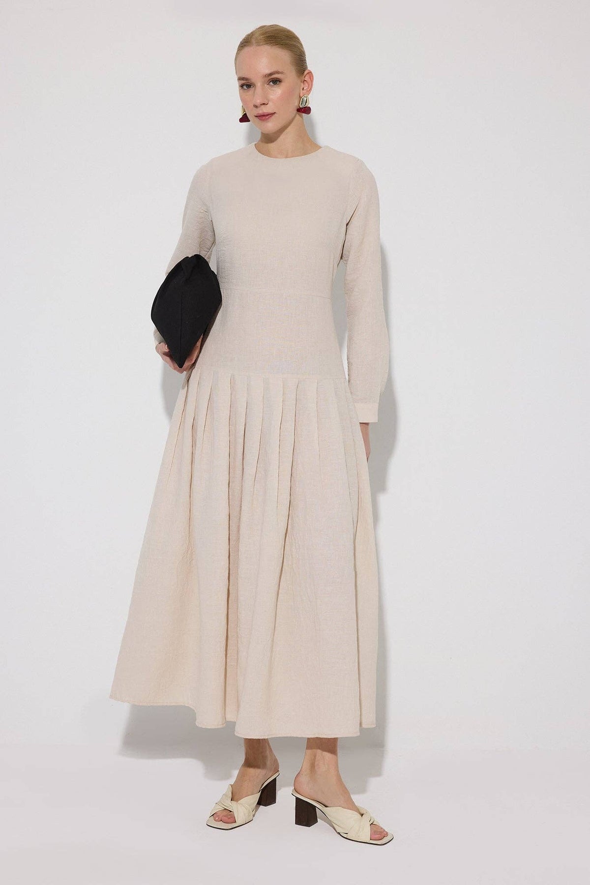 Pleated Waist Maxi Dress – Elegant Long Sleeve Minimal Dress in Stone | AVRENDI